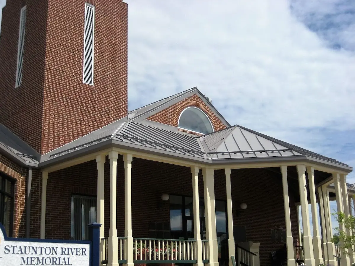 Skilled roofing craftsmen working on a residential roof in Soldiers Home